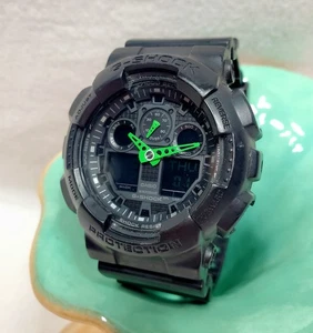 Orologio da polso CASIO G-SHOCK 5081 GA-100C resistente all'acqua 20 bar acciaio inox nero/grn funzionante - Foto 1 di 15