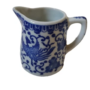 Jarra crema azul y blanca de colección hecha en Japón Flying Phoenix Nippon - Imagen 1 de 10
