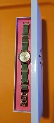 Reloj Isaac Mizrahi Live Mujer Tono Dorado Esfera Redonda Batería Nueva Foto 1 de 4
