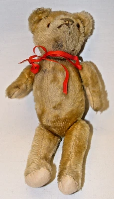ANTIQUE STUFFED SQUEAKER BEAR, 5 WAY JOINTED, GLASS EYES, 10" TALL - Image 1 of 2
