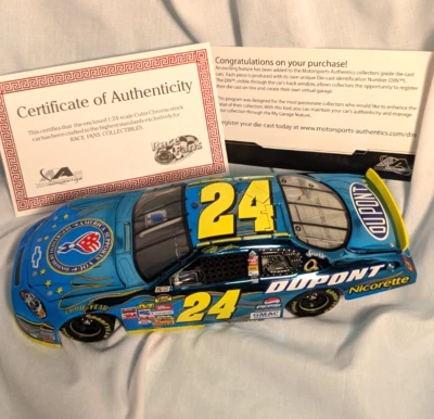 #24 Dupont 1:24 die cast stock Car Chrome DDD Military w/ COA #460/1000 - Image 1 of 4