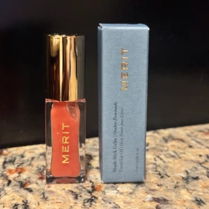 Merit Shade Slick Gelée getöntes Lippenöl Farbe Jete brandneu im Karton neu in OVP vegan - Bild 1 von 1