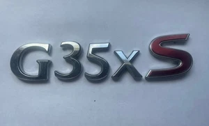 2007 2008 INFINITI “G35xS” REAR TRUNK DECK LID EMBLEMS OEM EMBLEM - Picture 1 of 4