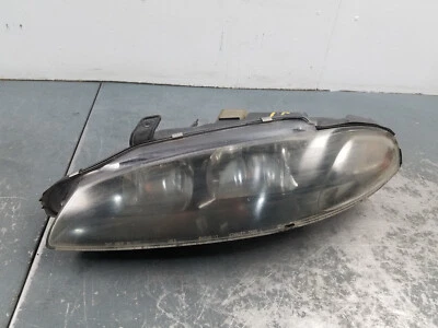 Luz de cabeza izquierda del conductor Mitsubishi Eclipse RS 1997 cupé -** #0587 H1 Foto 1 de 4