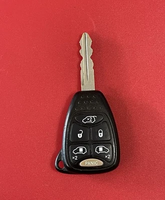 Dodge Grand Caravan 2004-2007 OEM 6 botones mando a distancia sin llave 2005 2006 ✅ Foto 1 de 4