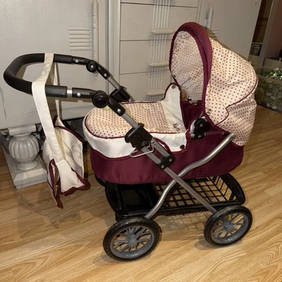 Cochecito Silver Cross Dolls con bandeja y bolsa - Diseño de lunares rojos - Se pliega Foto 1 de 4