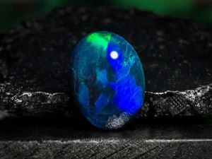 3.89 Carat Ethiopian Black Opal Cabochon 13x9x6 MM Oval Shape Welo Fire Opal - Picture 1 of 3