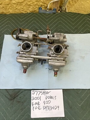 2001 Polaris RMK 800 原始设备制造商化油器碳水化合物架 277 — 第 1/4 张图片