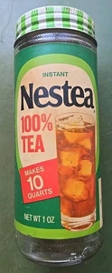 Vintage Nestle Nestea Instant Tee NETTO MIT ETIKETT 1 UNZE Glas Glas Metall Deckel Etikett 6" hoch - Bild 1 von 9