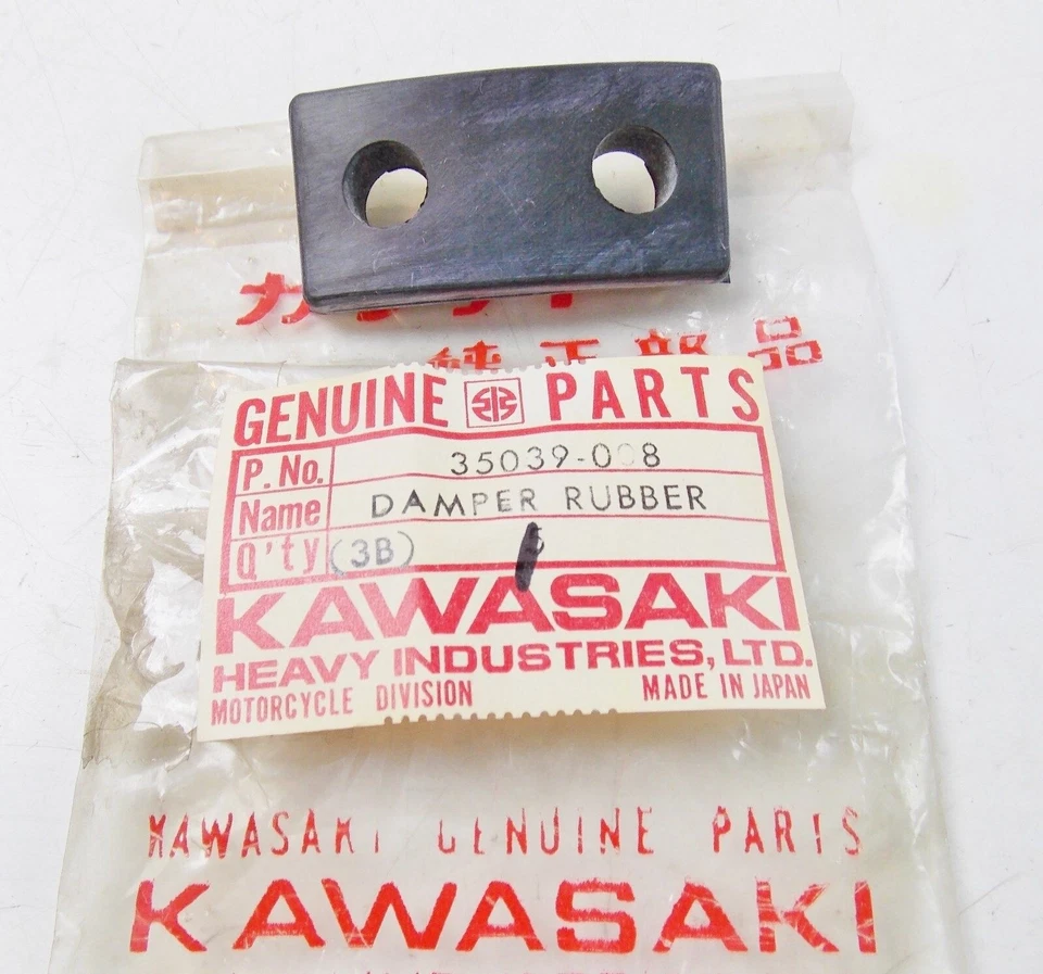 LÂMPADA TRASEIRA AMORTECEDORA DE BORRACHA ORIGINAL DO FABRICANTE 1973-81 KAWASAKI MC1 KM100 35039-008 - Imagem 1 de 1