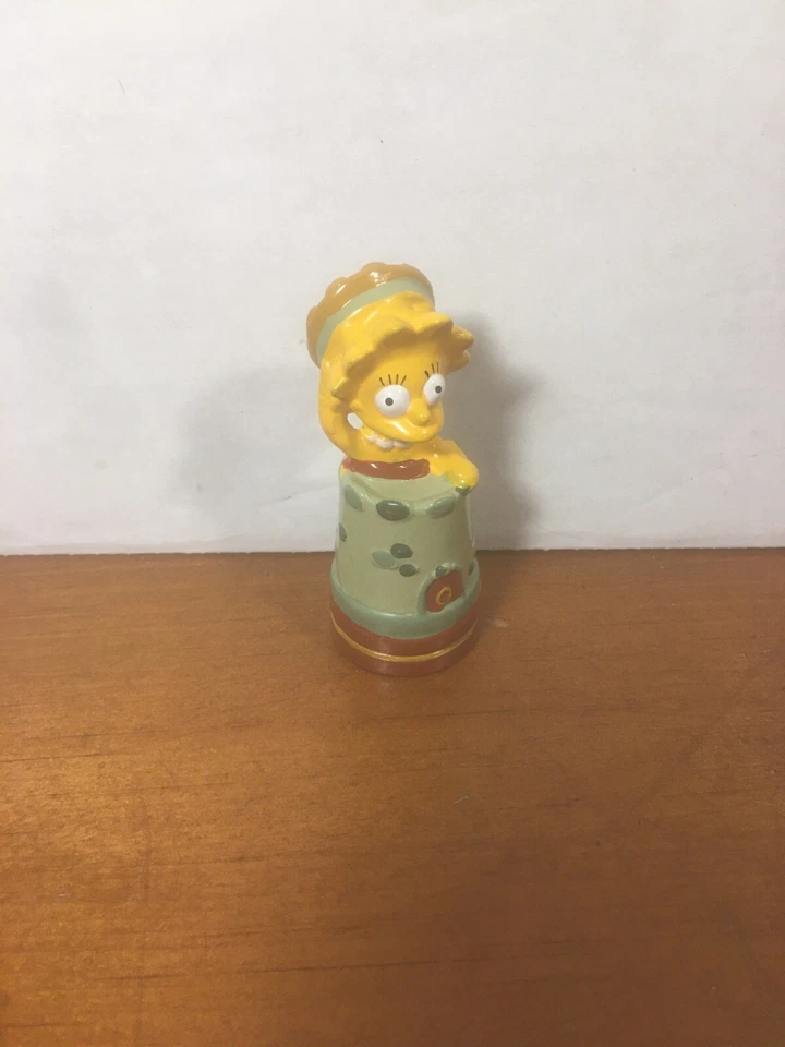Pieza de ajedrez roja de Los Simpson Lisa / Torre Foto 1 de 1
