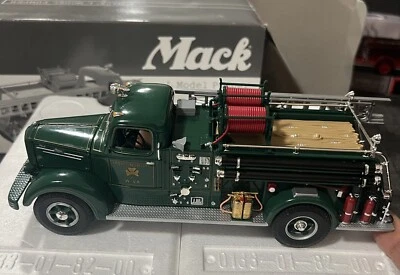 First Gear 1/34 Scale 19-3208 - Mack L Model Pumper - Smokey Bear Unique GREEN - Image 1 of 4