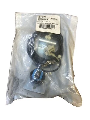 NEW SICK EL-1-E123P02 PHOTOELECTRIC SENSOR W/BRACKET 7029644. IN SLICK PACKAGING - Image 1 of 3