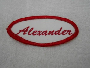 ALEXANDER USED SILK SCREEN VINTAGE SEW ON NAME PATCH TAGS OVAL RED ON WHITE - Picture 1 of 2