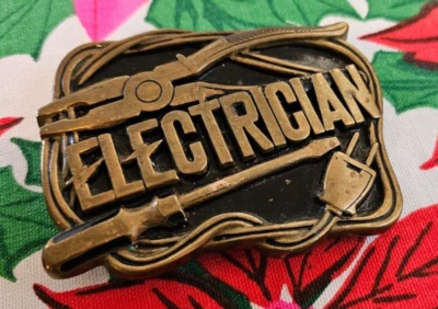 Hebilla de cinturón vintage de latón macizo de mediados de siglo de 3,5" x 2,2" electricista barón 1980 Foto 1 de 2