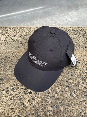 Gorra reflectante de nailon Stussy - negra Foto 1 de 4