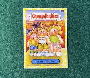 Garbage Pail Kids GPK: Go on Vacation - Rockin’ Roland “Phelgm Yellow” 68b