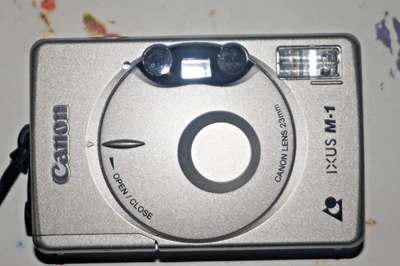 Vintage Silver -Canon IXUS M-1  -APS Compact Film Camera w/ Case - Tested - Image 1 of 4