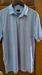 Camisa polo de golf Greg Norman SS para hombre MEDIANA *azul claro* palmera - jugar en seco - Imagen 1 de 5