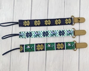 Notre Dame Pacifier Clip Football Pacifier Clip Baby Shower Gift Lillipop Holder - Picture 1 of 2