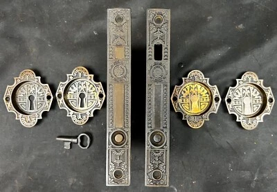 Beautiful Round Pull Bronze  Eastlake Double Pocket Door Set With Key - Image 1 of 4