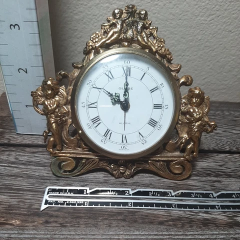 Vintage GLOBE Wind Up Alarm Clock Made In Germany Cherub Gilt Brass AS IS REPAIR Cover