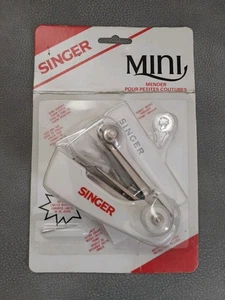 Mini reparador instantáneo de mano con aguja NOS Singer de colección - Imagen 1 de 4