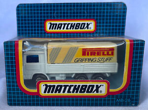 Matchbox-(1-75) MB 26 Volvo Tilt Truck Pirelli Gripping Stuff Dark Blue box 1987