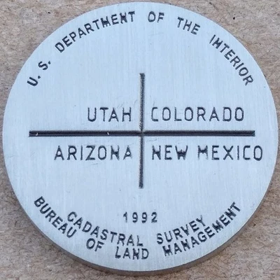 Four Corners Benchmark Micro Geocoin - Activated & Adoptable - TB1TA1C - Image 1 of 2