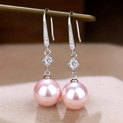 Pendientes colgantes de perlas rosas de imitación diamantes de imitación circonitas con clase de Pascua brillantes simples Foto 1 de 4