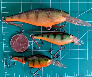 LOTE 3 SEÑUELOS DE PESCA ARTICULADOS RAPALA CRANKBAITS BUCEO PROFUNDO SOMBREADO RAP PERCHA BALSA de colección - Imagen 1 de 8