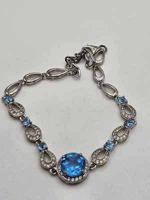 Brazalete de plata esterlina con acento de circonita cúbica de vidrio azul tono plata de moda Foto 1 de 4
