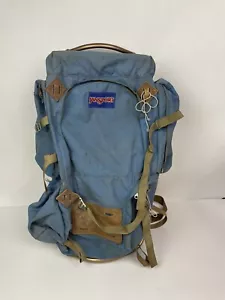 Mochila vintage con marco de metal Jansport alas de cadera senderismo camping hecha en EE. UU. azul - Imagen 1 de 11