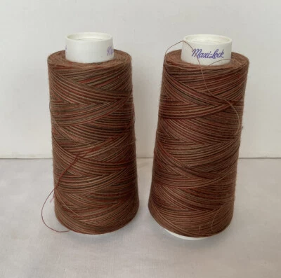 Maxi-Lock Serger Thread 2 Cones Color M65 Mocha Al Fudge Opened - Image 1 of 4