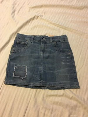 Arizona Jean: Girl's Adj. Waist Distressed Denim Skort, Medium Wash: Blue, 12,14 - Image 1 of 4
