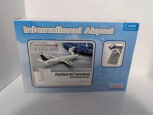 DRAGON WINGS A340-300 AIR CANADA W/ TERMINAL AND BOARDING BRIDGE 1:400 - Picture 1 of 14