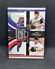 2005 Playoff Prestige Curt Schilling /25 Dual Game Worn Patches Changing Stripes