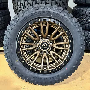 20x10 Fuel D681 Bronze Rebel Wheels 33" RT Tires 8x6.5 Dodge Ram 2500 3500 - Picture 1 of 6