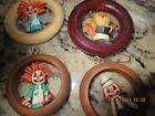 FOUR VINTAGE HAND CRAFTED QUILL ORNAMENTS IN WOOD CIRCLE--1979--#R7-3