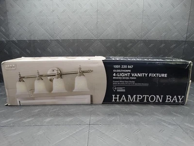 Lámpara de tocador Hampton Bay Olgelthorpe 29,8 pulgadas 4 luces de níquel cepillado Foto 1 de 4