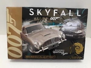 Micro Scalextric Skyfall 007 Celebrating 50 Yrs Aston DBS DB5 4+ 2 Cars 19V 1:64 - Picture 1 of 11