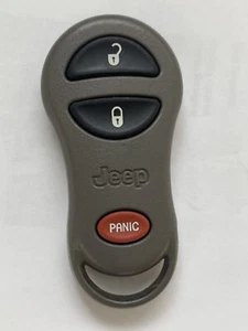 1999-2004 JEEP GRAND CHEROKEE KEYLESS REMOTE TRANSMITTER 56036860AD JEEP OEM🟠 - Picture 1 of 24