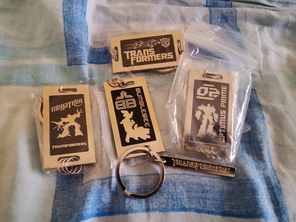 Transformers 4 Keychains Lot - Image 1 of 1