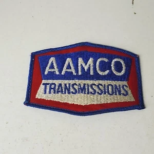 De colección AAMCO Transmisiones Uniforme Sombrero Chaqueta Abrigo Parche Automotriz Mecánico Logo - Imagen 1 de 4