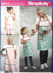 Sewing Pattern -Simplicity 8815 a Sz. S-L Aprons for Child & Misses - Picture 1 of 6