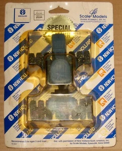 1/64 Scale Models New Holland TJ375 with triples in package. - Picture 1 of 2
