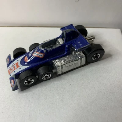 Coche Hot Wheels 1977 Lickety Six azul Fórmula Uno F1 Hong Kong Base Blackwall Foto 1 de 4