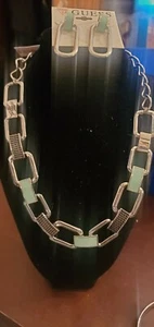 New with tags. GUESS silvertone and aqua colored link  necklace and earring set. - Picture 1 of 7