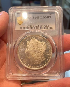 1884 O PCGS MS62DMPL Morgan $1 scatola 105 - Foto 1 di 2