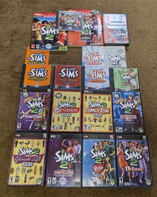 USED The Sims and Sims 2 PC Lot w/ 6 Games and 8 Expansion Packs, Guides, Manual - Image 1 of 4